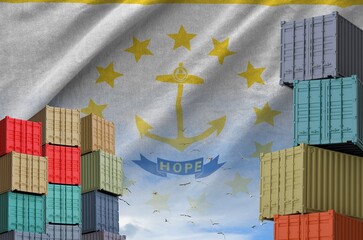Rhode Island US state flag and big stack of shipping cargo containers in docks with sky background...