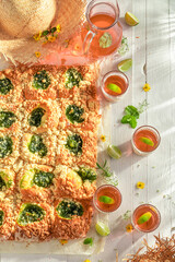 Sweet and delicious gooseberry cake served with lemonade.