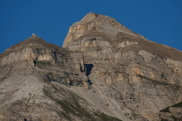 Fototapeta premium Serles Mountain in Stubaital stands tall during a summer sunset, showcasing a stunning view in Tyrol, Austria.