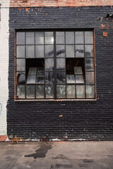 Grungy Black Urban Brick Warehouse Windows