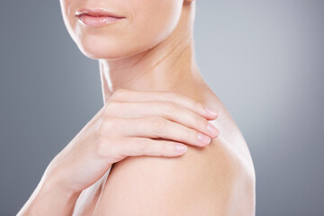 Studio, skincare and shoulder of woman with soft touch, wellness and luxury skin treatment results....
