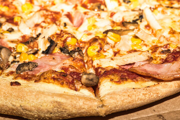 Freshly Baked Pizza with Ham, Chicken, Mushrooms, and Corn