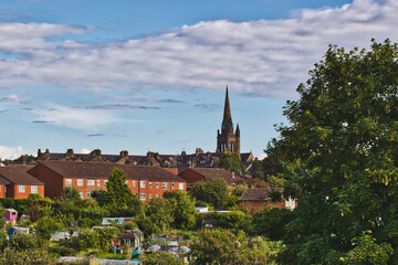 Fototapeta premium Small town with church steeple and residential buildings