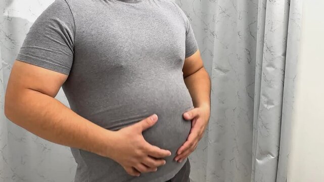 Man fat belly, The fat on the stomach of fat man over weight as for healthy concept. High quality 4k footage. High quality 4k footage