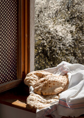 Freshly Baked Somuni on Traditional Bosnian Window (Musebak)