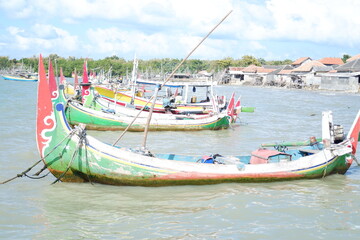 fishing boat on the beach in an  indonesia
