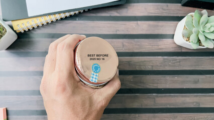 Close up text best before date on bottle cap food