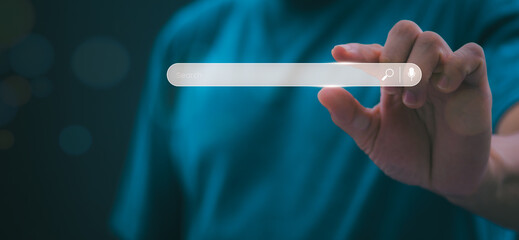 Information search technology, search engine optimization, male hand using a smartphone to search information, using the search bar function on your website