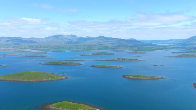 Aerial panorama of Clew Bay's archipelago of islands, partly drowned limestone drumlins formed by glacier. Aka Cuan Modha, one of nature's greatest spectacles when viewed from above. Co. Mayo, Ireland