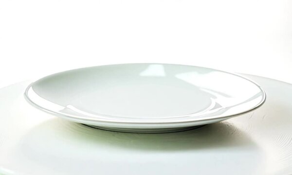empty white plate in white background
