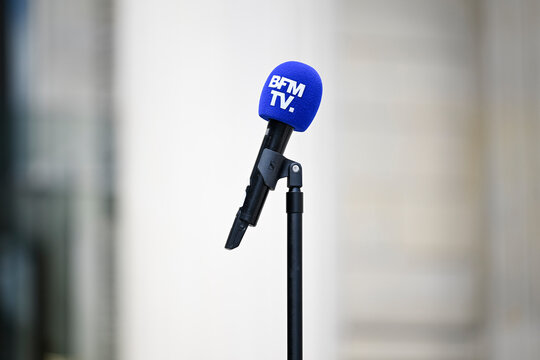 Illustration picture shows a microphone (mic, mike, micro) with the logo of the television news channel BFMTV or BFM TV  in Paris, France on July 10, 2024.