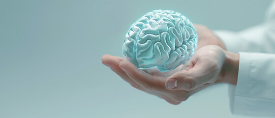 A person is holding a brain in their hand