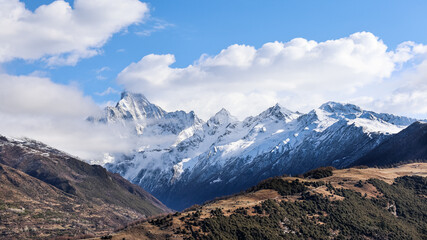 Panoramic view of Mount Siguniang of Four sisters mountain in Sichuan China, featuring the four peaks with Yaomei feng the tallest