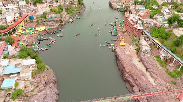 Aerial view of a river boats sailing in it