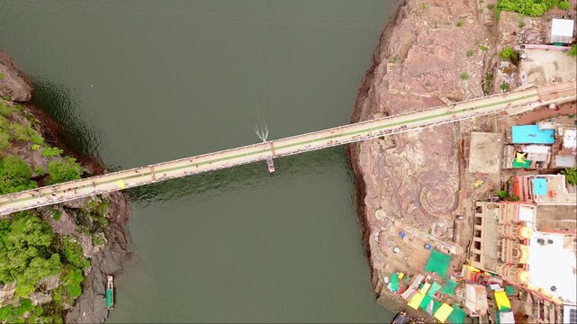 Aerial view of bridge over river with pedestrians