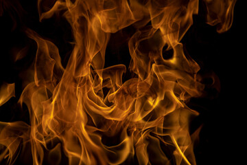 Texture of fire on a black background. Abstract fire flame background, large burning fire.