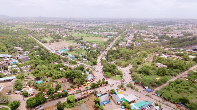 Aerial view of cityscape with converging roads