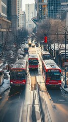A city bus terminal with buses arriving and departing