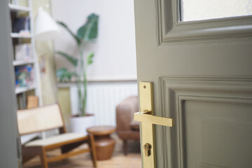 open door concept with Door handle and blur interior room background,