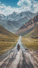 A stunning landscape featuring a winding road through majestic mountains, inviting adventure and exploration.