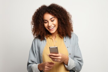 Fototapeta premium Woman play mobile phone smile adult happy.