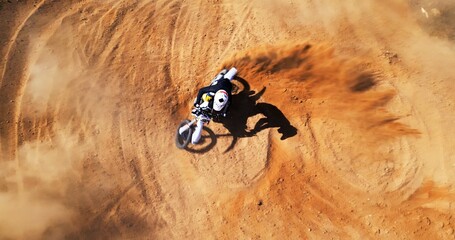 Person, motorbike and riding on sand for sport with speed training, performance technique and...