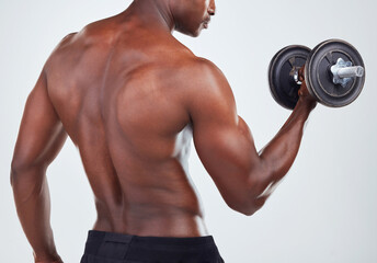 Weight, dumbbells and back of black man in studio for workout, bodybuilder training and gym...