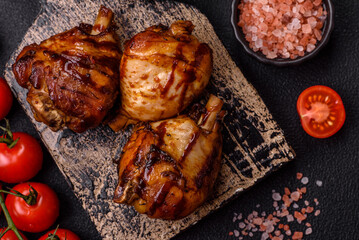 Delicious grilled chicken legs with spices and herbs