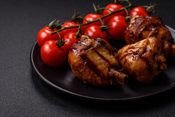 Delicious grilled chicken legs with spices and herbs