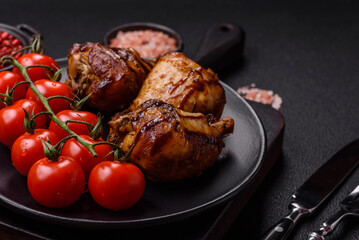 Delicious grilled chicken legs with spices and herbs