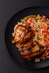 Delicious grilled chicken legs with spices and herbs