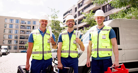 Skilled mechanics ready to fix your car! Smiling technicians