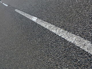 Fototapeta premium Tarmac on road with white paint - Stonehaven - Aberdeenshire - Scotland - UK