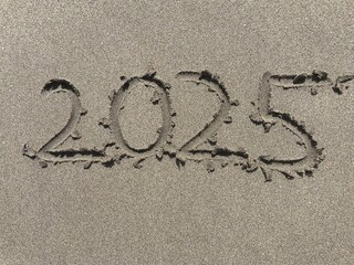 new year 2025 on the sand
