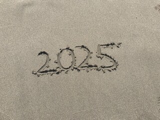 inscription on the sand - 2025