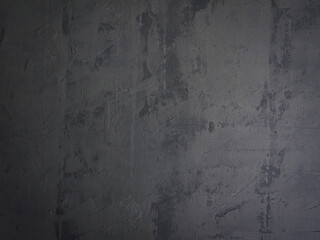 Close-up of dark gray cement texture in Loft style for building and construction backgrounds.   