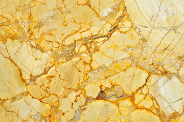 An artistic shot of yellow marble with light reflections highlighting its polished surface and natural patterns