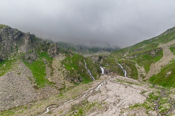 Dramatic Waterfall Cascading Down a Rocky Slope in the Zillertal