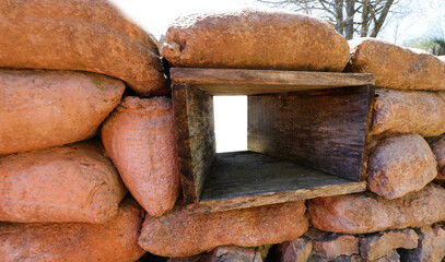 firing slit inside a trench  with sandbags for soldier protection during the war