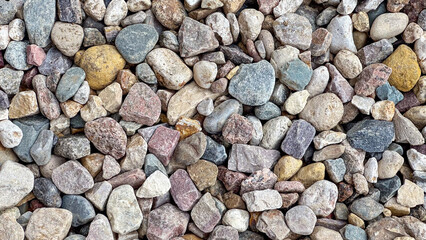 granite crushed stone of different colors as a background