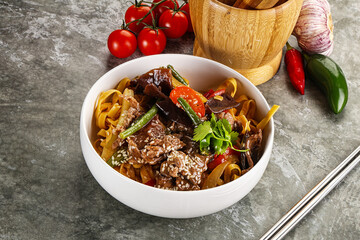 Asian wok with noodle, vegetables and beef