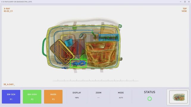 X-ray Luggage Security Check For International Tourist Protection Discovers Explosive Bomb. X-ray Luggage Scanner At Airport For Protection Against Terrorism. Plane Protection By Luggage X-ray Scanner