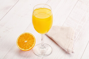 Sweet fresh orange juice in the glass