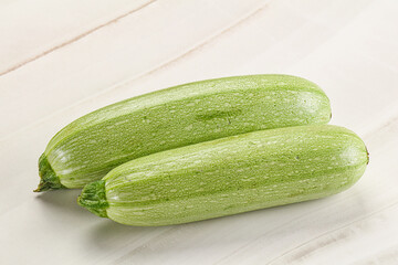 Raw green ripe zucchini vegetable