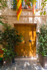 a wooden door of a building in the old town