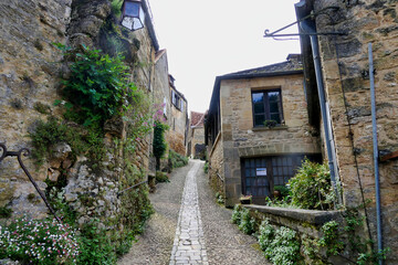 Steep medieval street located in Beynac et Cazenac a fortified town in the Dordogne, France
