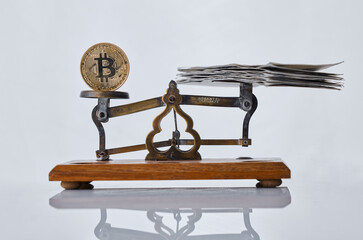Scale, crypto and coin with paper, cash and studio for digital trading by white background. Person,...