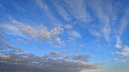 cloudburst on sky with clouds - cute weather bg - photo of nature