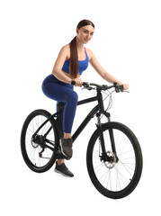 Naklejka premium Smiling woman riding bicycle on white background