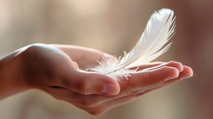 Hand Grasping Delicate Feather